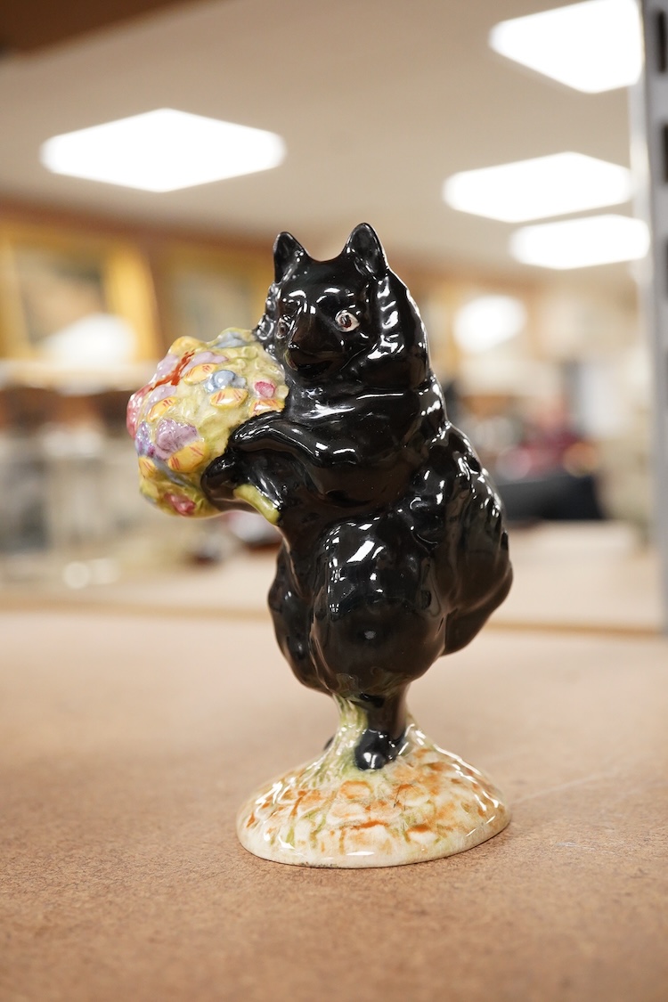 A Beatrix Potter F Warne and Co Ltd, Beswick figure of “Duchess” with flowers, gold stamp to base. 10cm high